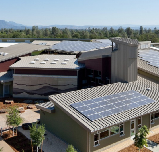 Large metal roofing system on commercial complex