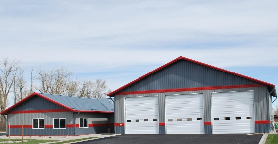 TWO GREY AND RED METAL  COMMERCIAL BUILDINGS