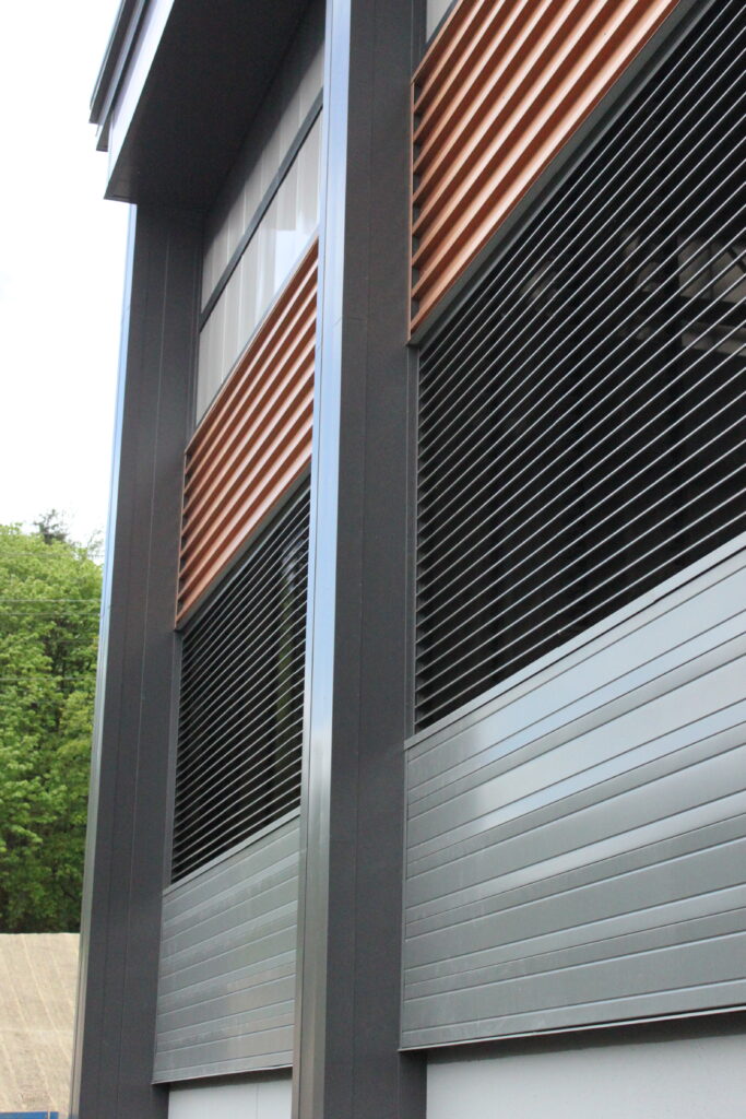 commercial metal building with different types of metal wall panels
